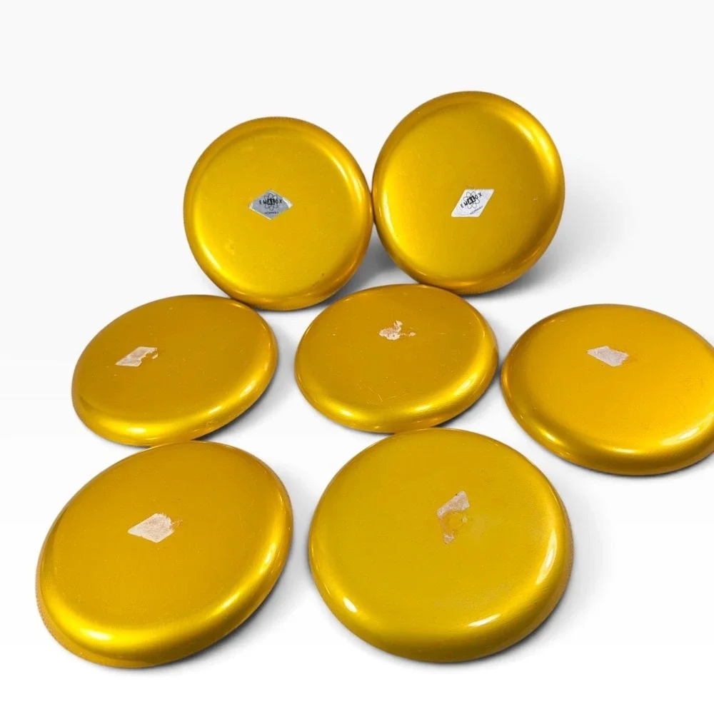 Vintage Emalox Norway Yellow Gold Anodized Aluminum Coasters Set of 7 MCM 4in